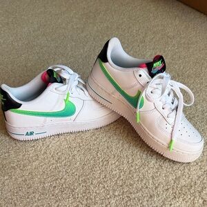 Nike Kids White Sneakers with Green Accents